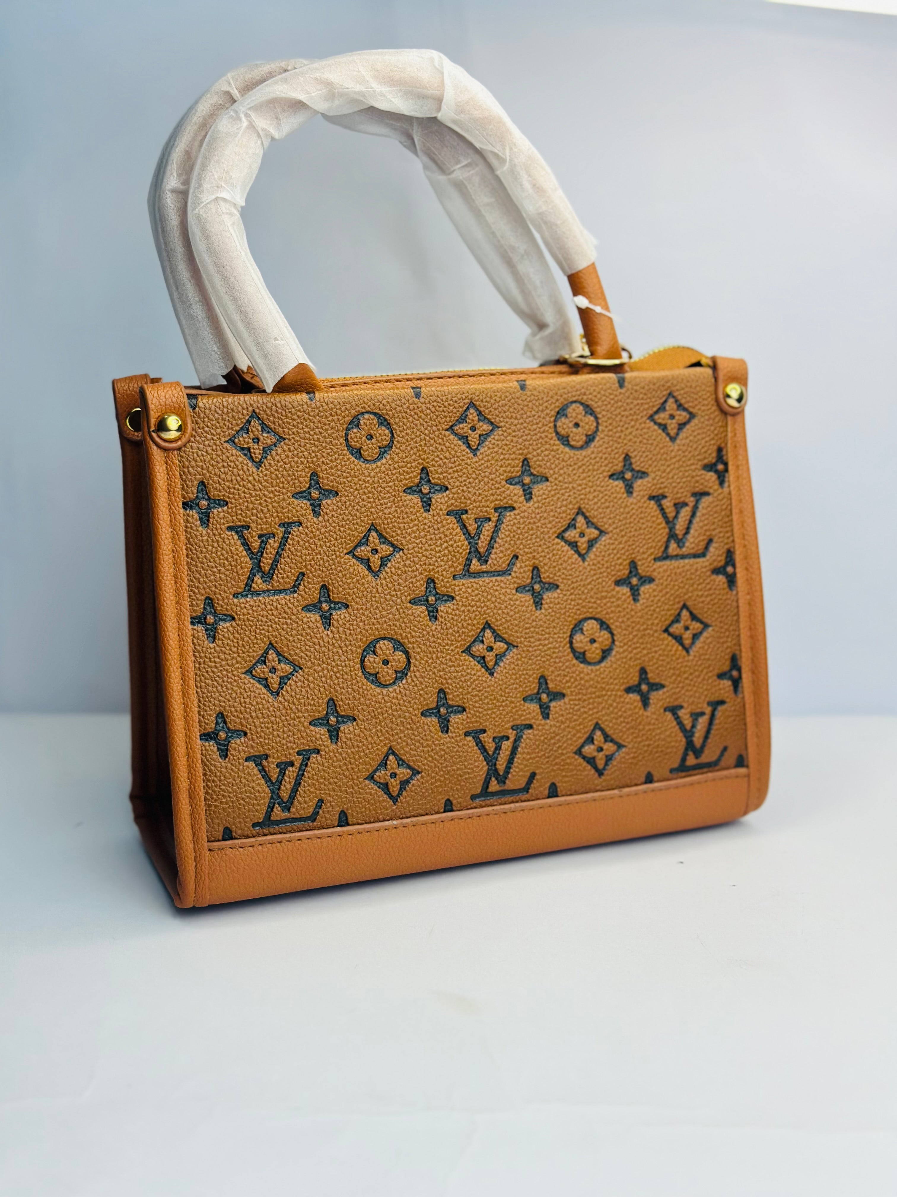 LOUIS VUITTON HAND BAG WITH TEXTURED LEATHER TRIM